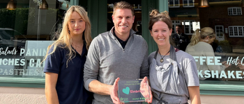 People holding a Love Elmbridge award