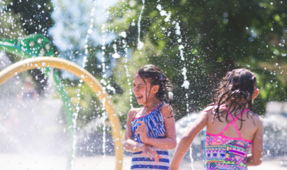 Children playing at splash pad