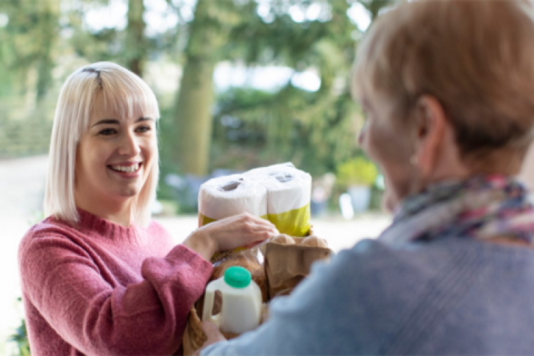 Volunteers delivering food shopping