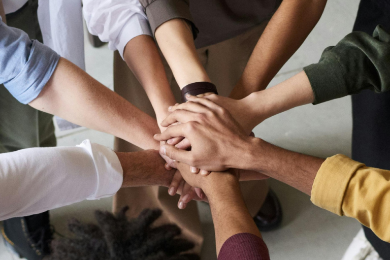 people giving group high five