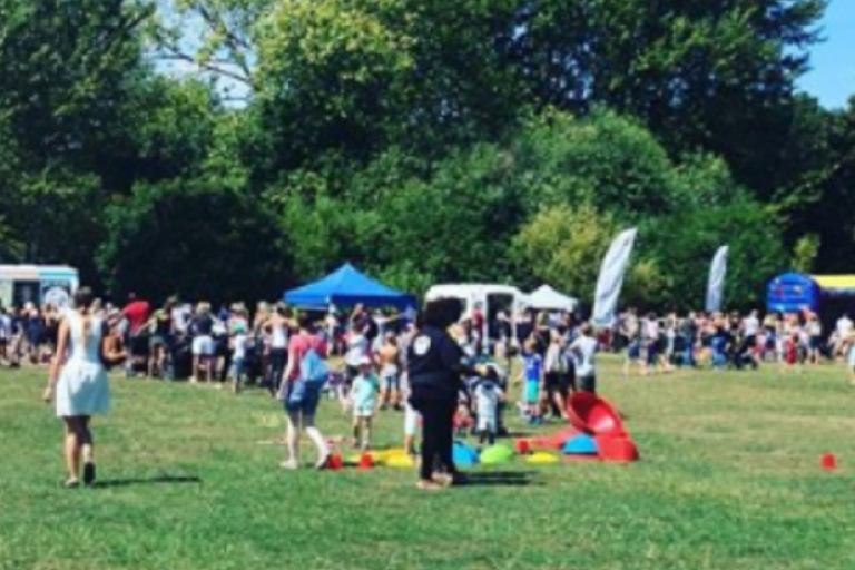 Children enjoying outdoor activities in Elmbridge park