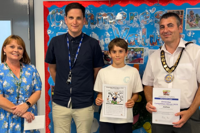 Junior citizen winner Joshua with the mayor of elmbridge, Cllr Hewens and school headmaster