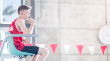 Lifeguard watching swimming pool