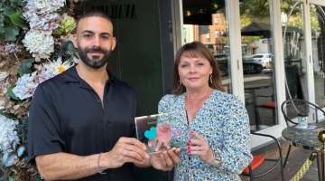 Councillor Kirsty Hewens and Ramon Mullan the 2023 winner holding the 2023 trophy.