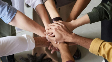 people giving group high five