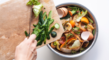 vegetables on a chopping board and saucepan