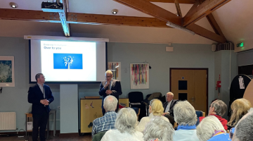Council leaders presenting to members of the public at a local community centre